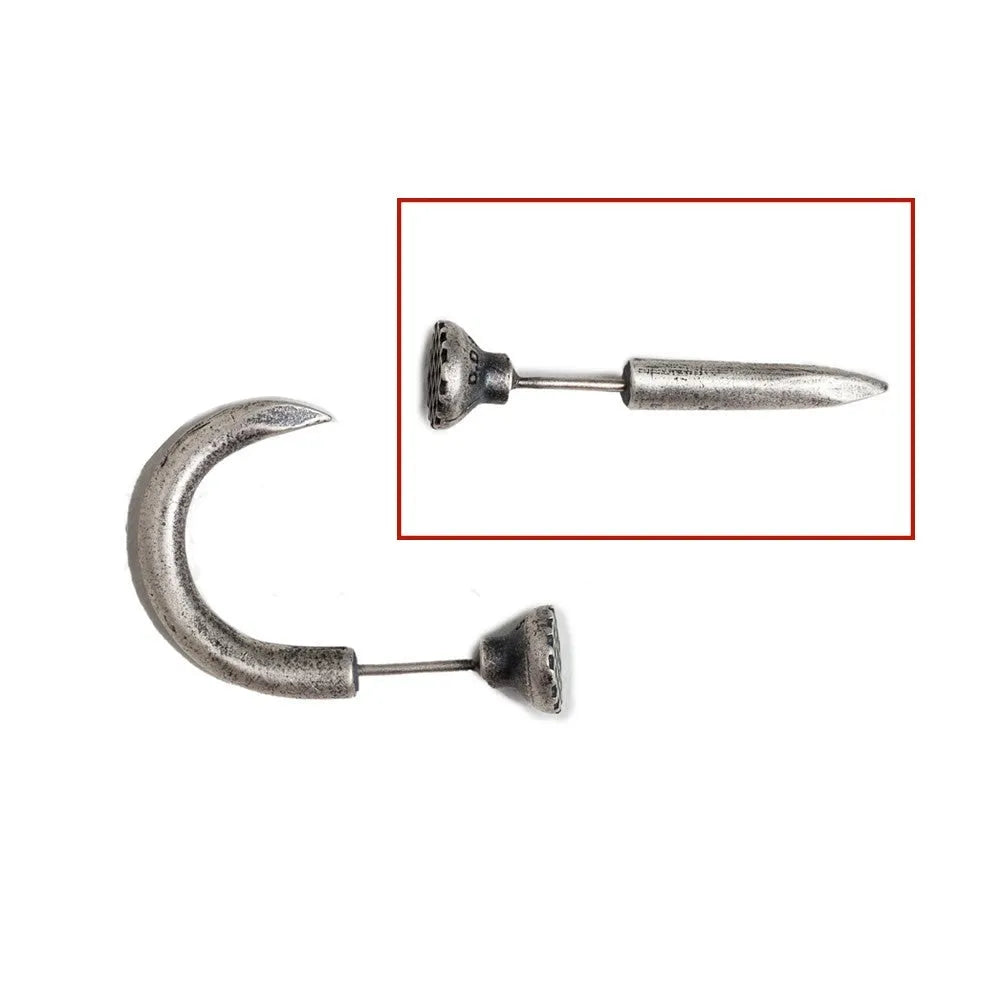 Sterling silver punk-style nail stud earrings on ear hook, showing straight and curved nail designs.