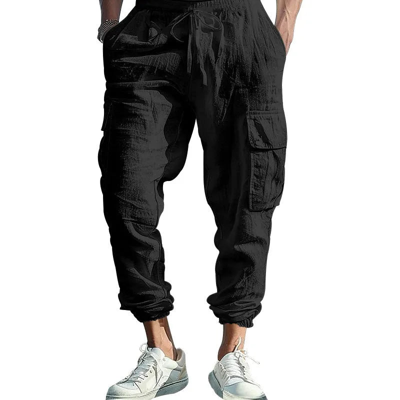 Men's linen casual trousers in Army Green with multi-pockets and an ankle tie closure.