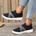 Black women's flyknit mesh flat shoes with rubber soles and round toe tassel decoration