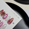 Three-dimensional carved nail art patches with hand-painted designs for almond-shaped nails