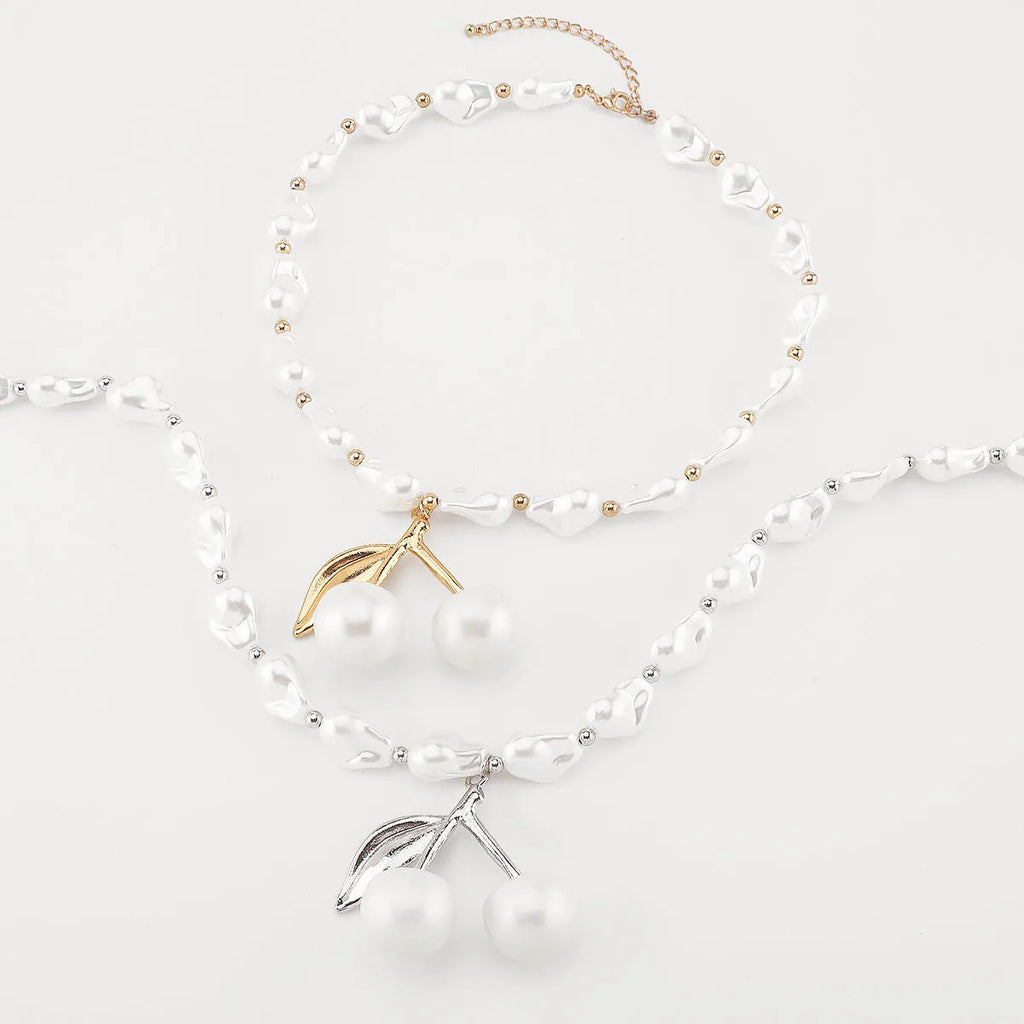 Gold electroplated alloy fruit necklace with pearl chain adjustable from 51cm to 60cm