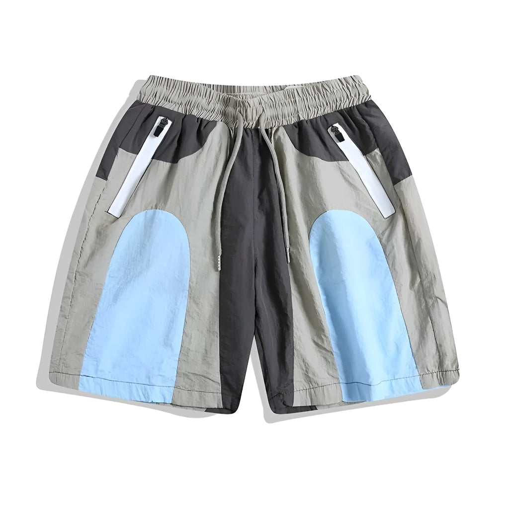 Blue patchwork quick-drying beach shorts with loose straight-leg fit and micro-elastic waistband