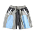Blue patchwork quick-drying beach shorts with loose straight-leg fit and micro-elastic waistband
