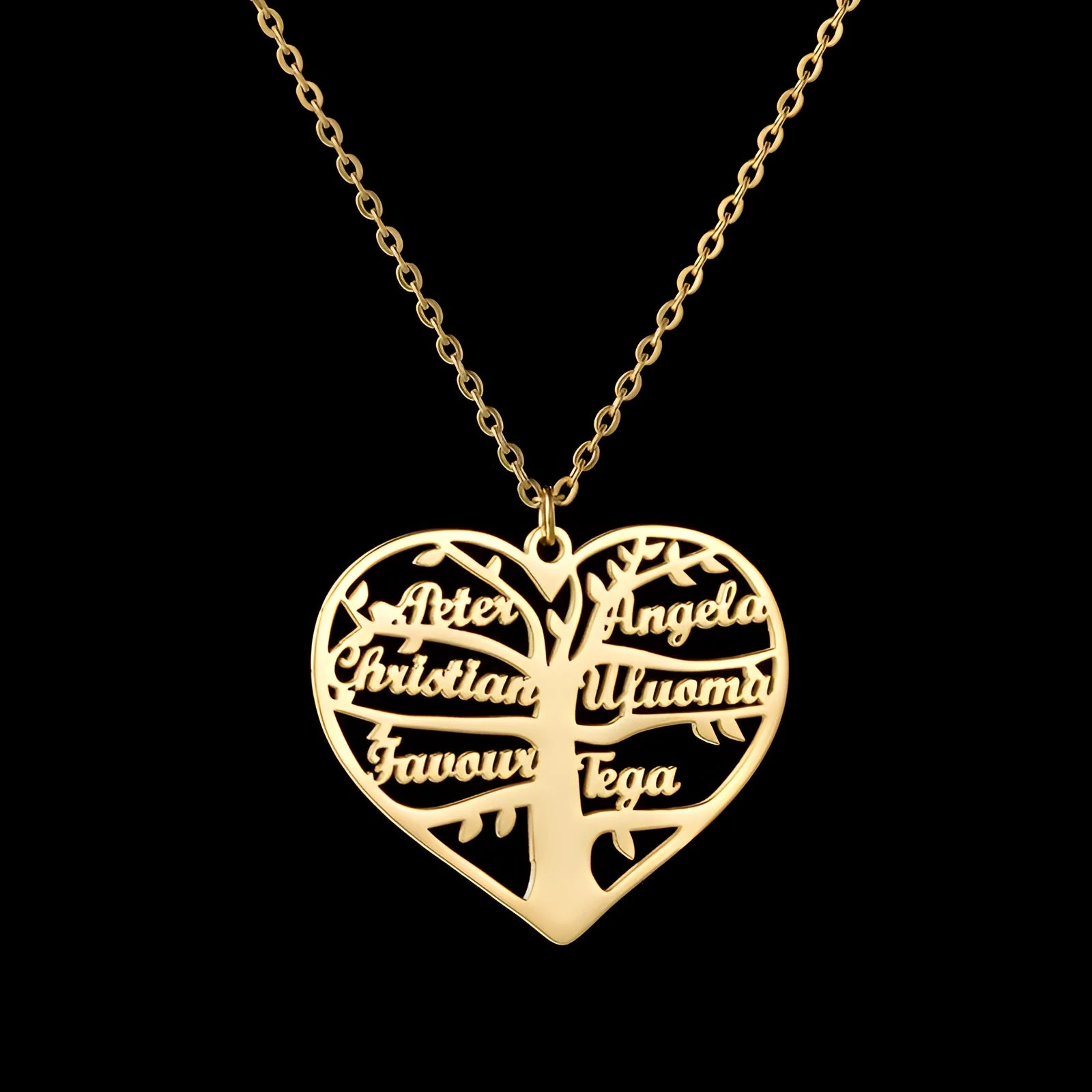Custom engraved women's necklace with hollow heart and tree pendant on an adjustable chain.