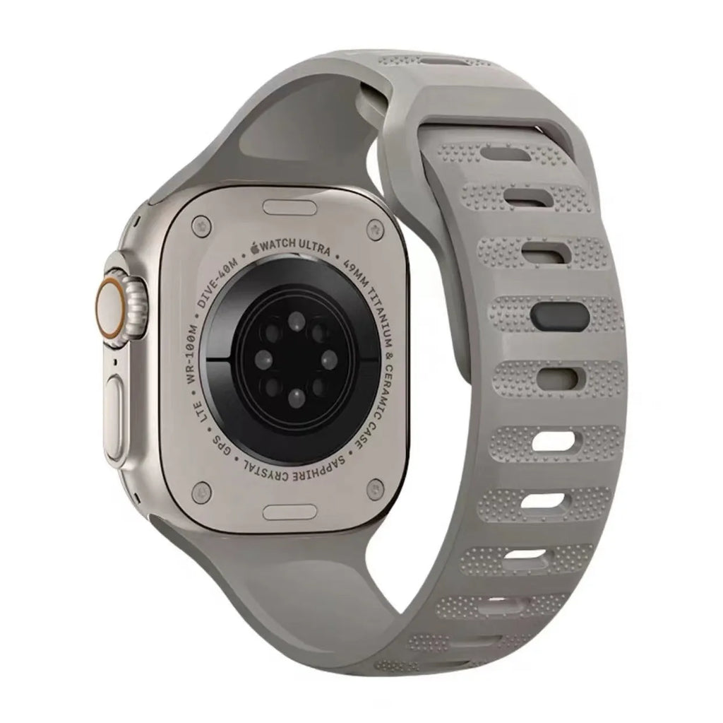 Fluoro rubber replacement watch strap for Apple Watch Ultra and Series models in various colours on a grey background.