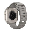 Fluoro rubber replacement watch strap for Apple Watch Ultra and Series models in various colours on a grey background.