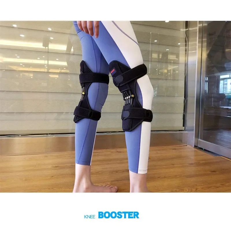 Adjustable spring-loaded knee support brace with straps on a grey background.