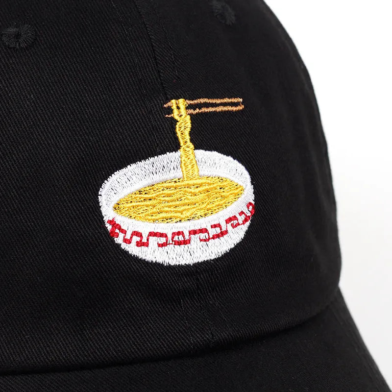 Cotton baseball cap with adjustable size, curling eaves, and dome top in blue, black, white, and pink