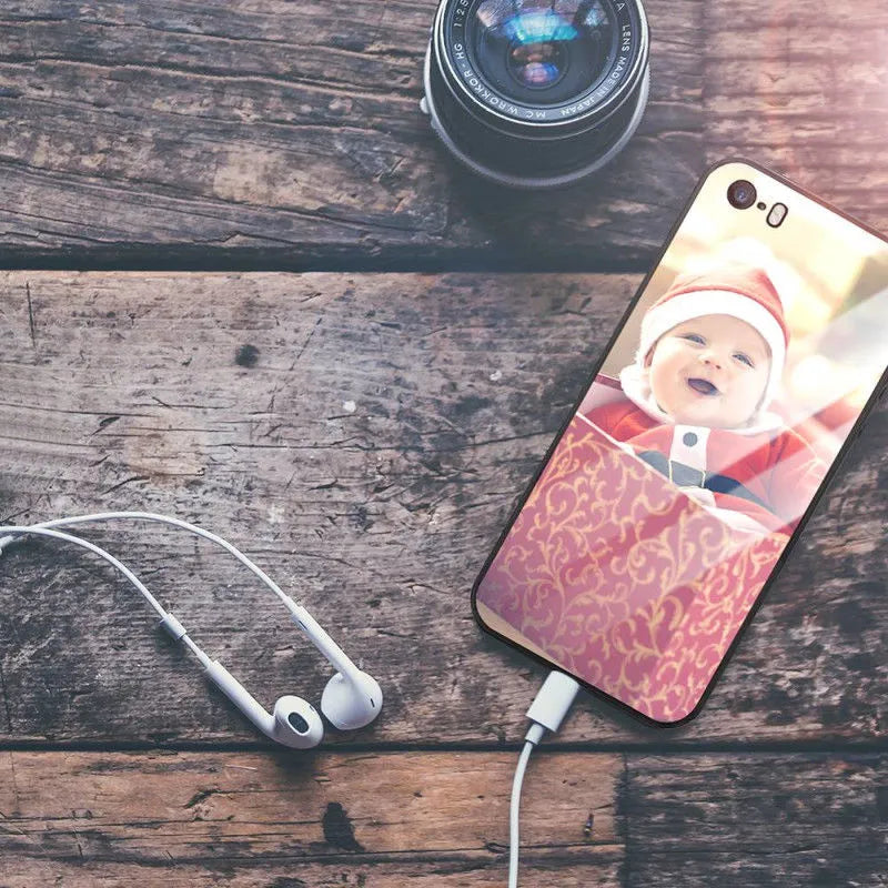 Custom patterned slim iPhone case showing raised edges protecting camera and screen on a compatible phone.