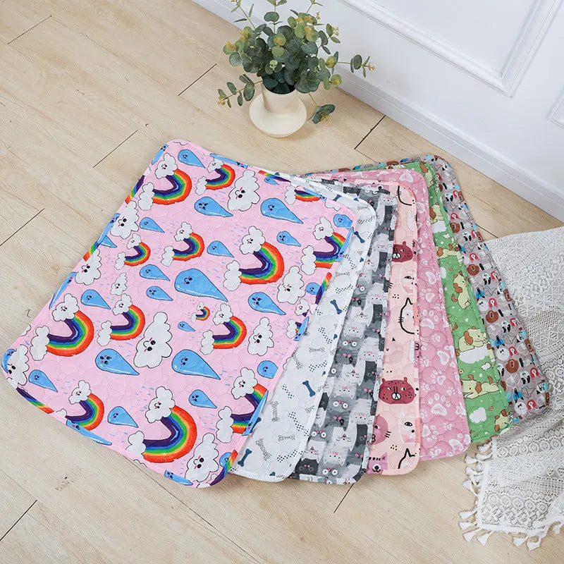 Reusable cloth pet urine pad with colourful animal print and waterproof backing.