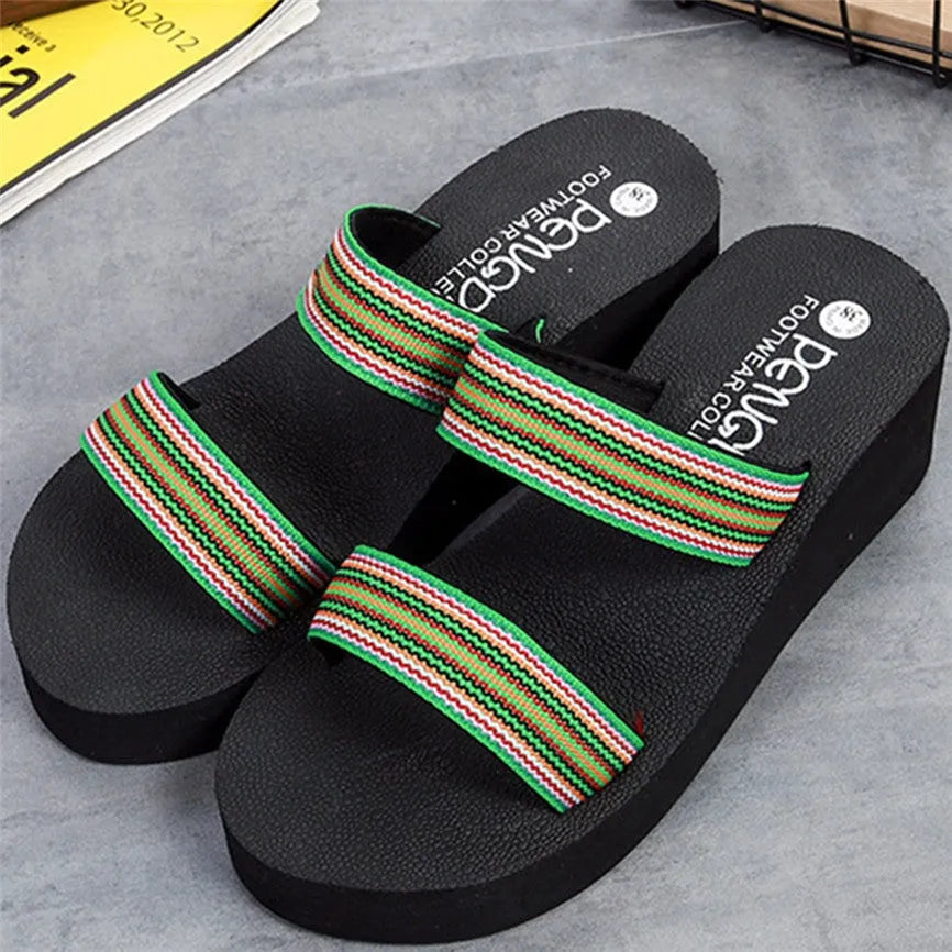 Brown women's bohemian slippers with an adjustable strap and a wedge heel.