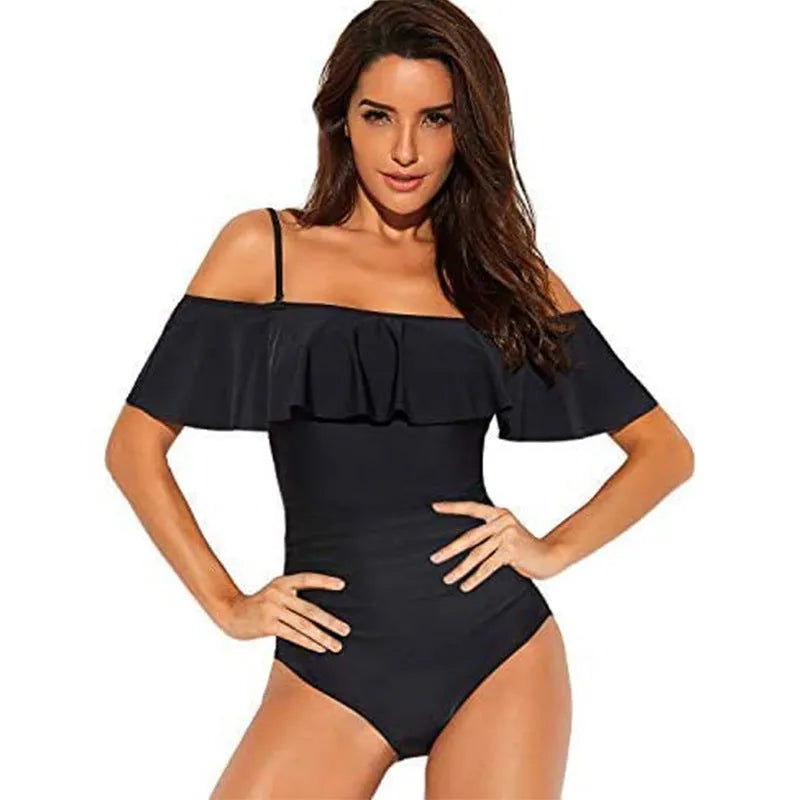 Black one-piece swimsuit with cut-out design and ruffled straps for swimming