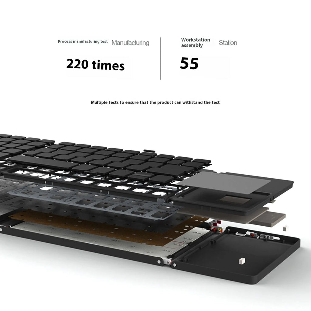 Black tri-fold portable Bluetooth keyboard shown open next to a smartphone, demonstrating its compact size.