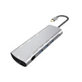Grey USB-C docking station with HDMI, VGA, and USB ports on aluminium alloy body