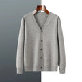 Man wearing loose fit V-neck Andy velvet cardigan coat in dark blue colour
