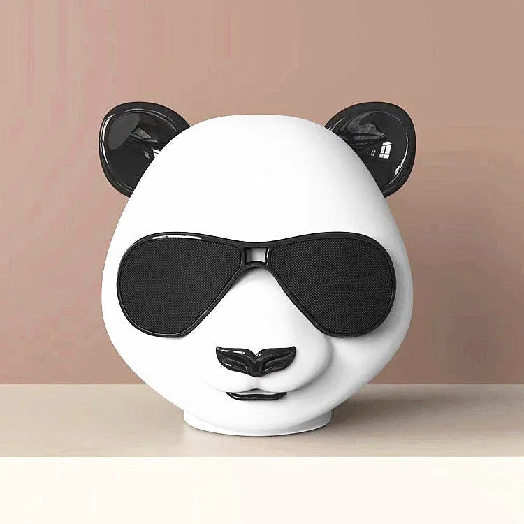 Portable mini Bluetooth speaker in classic style with USB port.