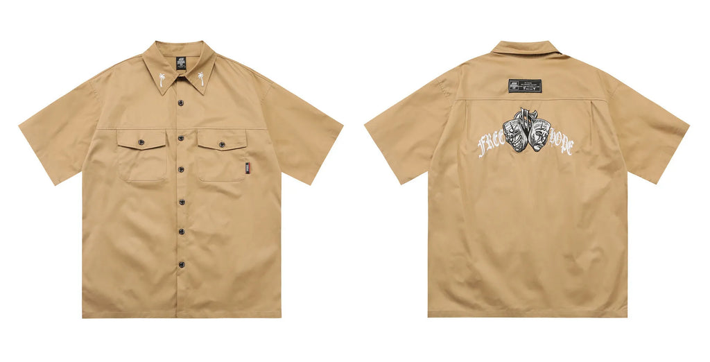 Men's black cotton blend loose fit pocket shirt with half sleeves and embroidered details