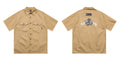 Men's black cotton blend loose fit pocket shirt with half sleeves and embroidered details