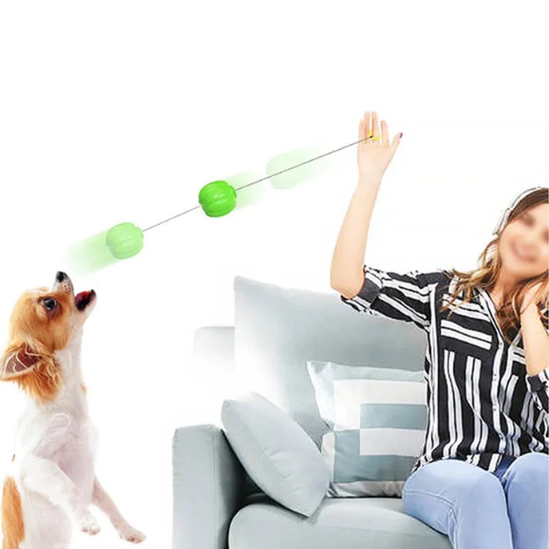 Green, orange, and yellow plastic pumpkin-shaped dog balls with squeakers for small dogs
