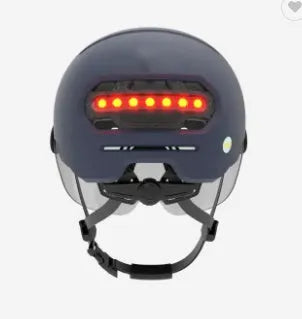 Cycling helmet with integrated rear LED brake light and tail light, shown in size M and L.