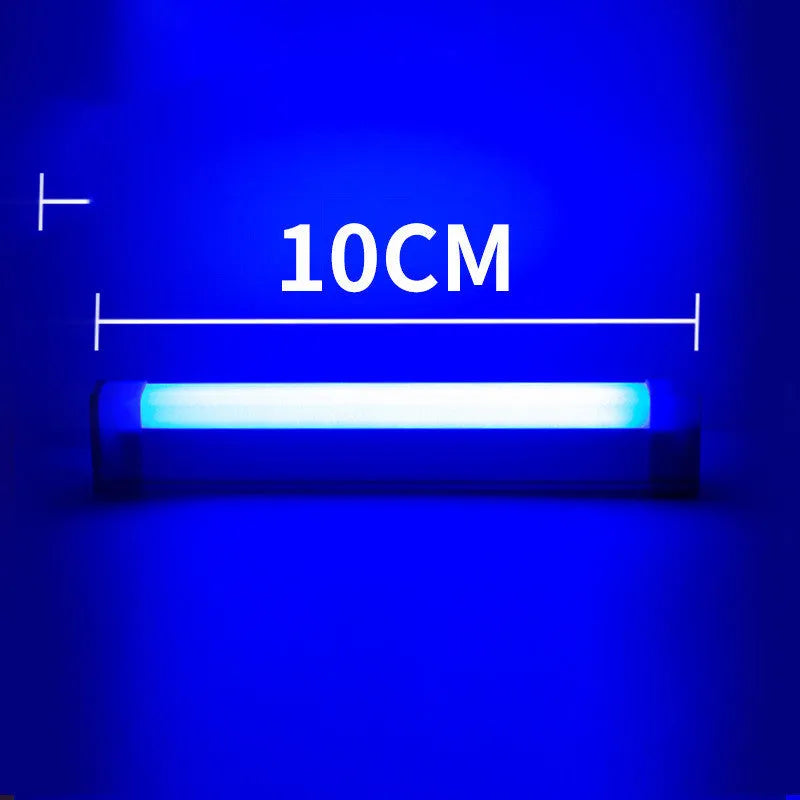A rechargeable LED light tube stick showing blue or purple glow, used as a fill light for photography or dormitory decor.