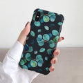 Black silicone leaf pattern phone case shown fitted on an iPhone.