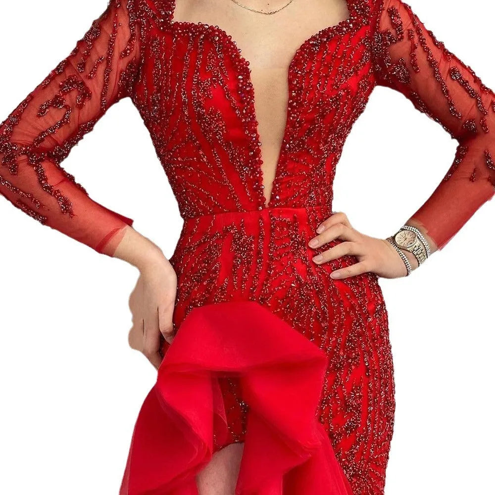 Red deep V sequined fishtail dress with princess sleeves on female model