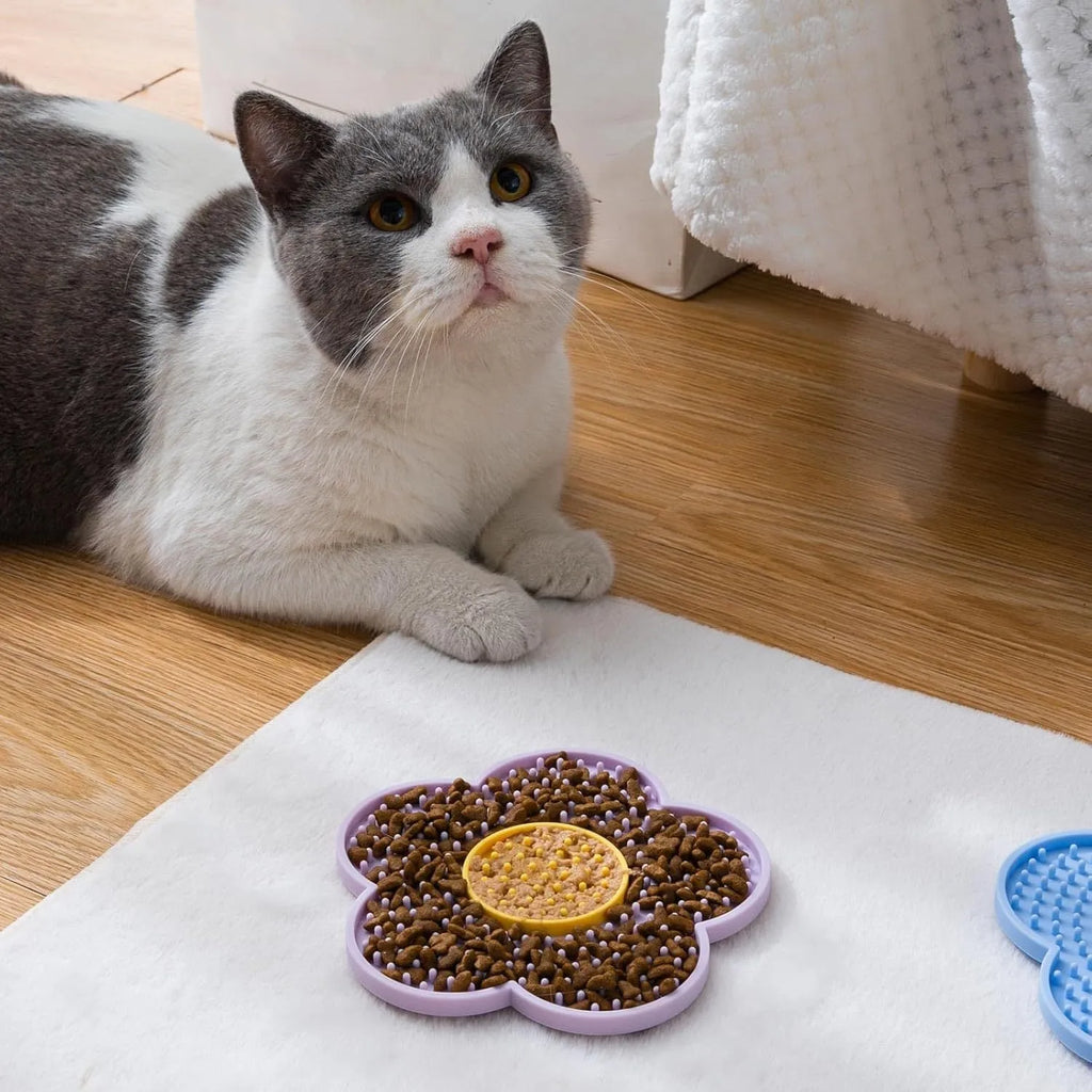 Flower-shaped silicone pet lick mat with suction cups in blue, grey, pink, purple, or red