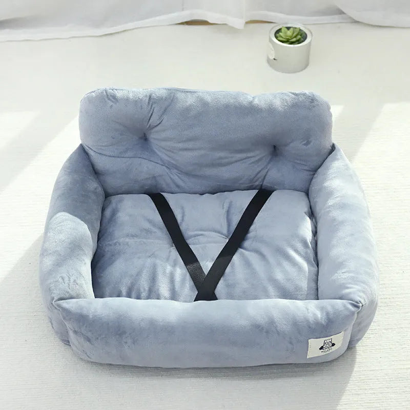 Car-mounted pet travel nest in stain-resistant cloth fabric showing grey and blue plaid colour options