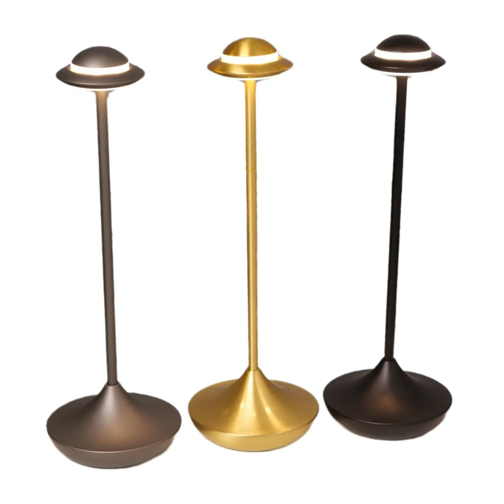 UFO-shaped metal table lamp with touch dimming control in gold, grey or black finish