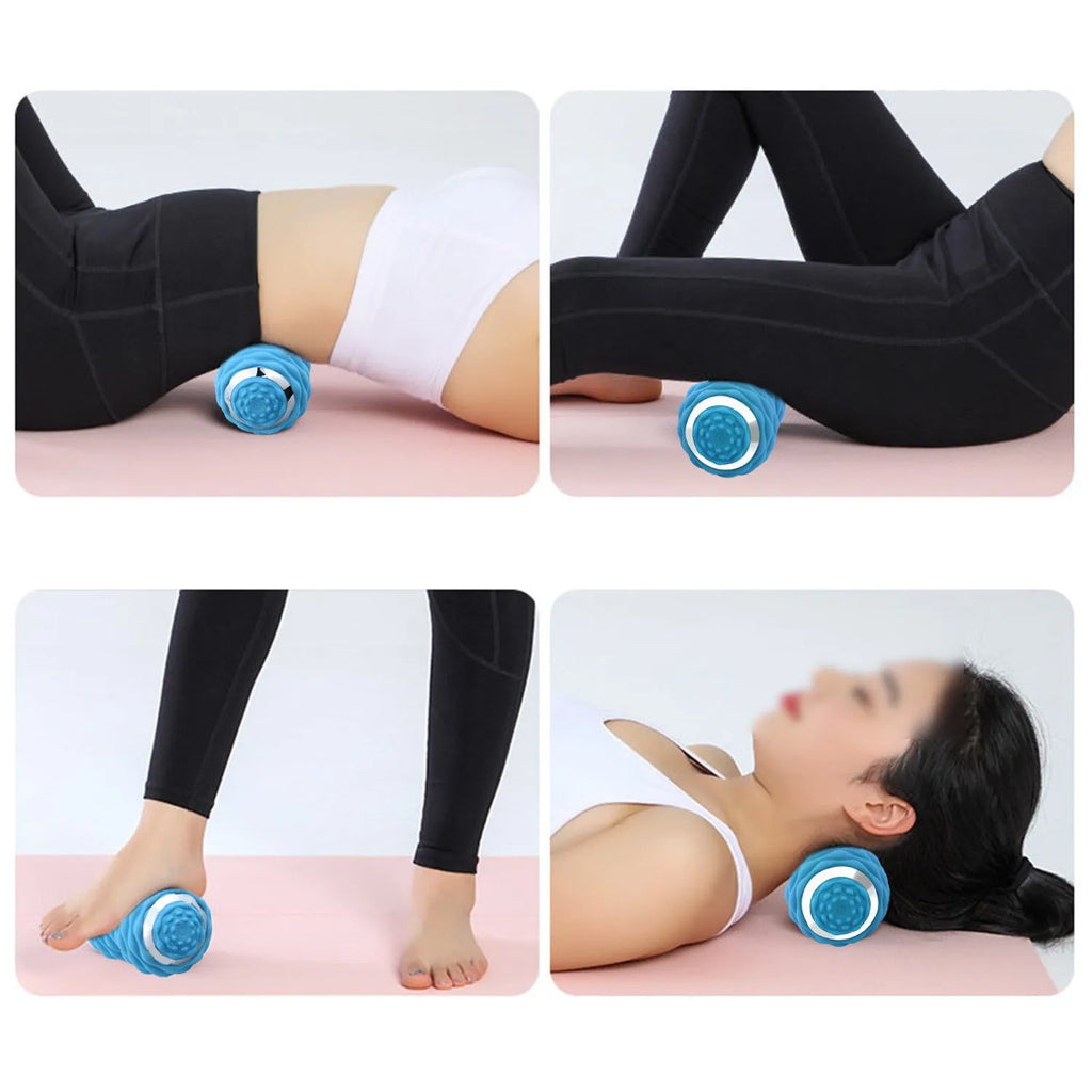 Electric peanut fascia massage ball in black and sky blue on a gym floor for muscle recovery