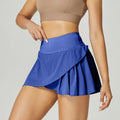 Women's solid colour quick-drying sports shorts in nylon with spandex lining for running and gym.