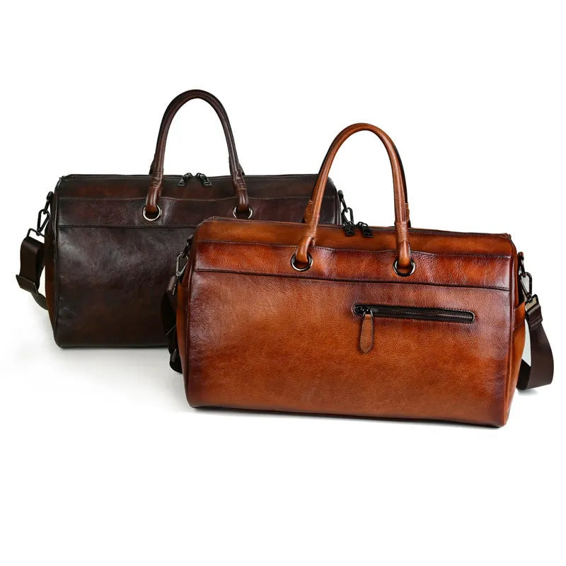 Genuine leather handmade retro travel bag in vintage brown with large capacity.