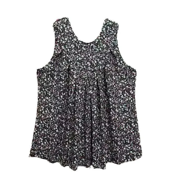 Black floral print sleeveless vest on hanger showing round neckline and loose fit for plus sizes