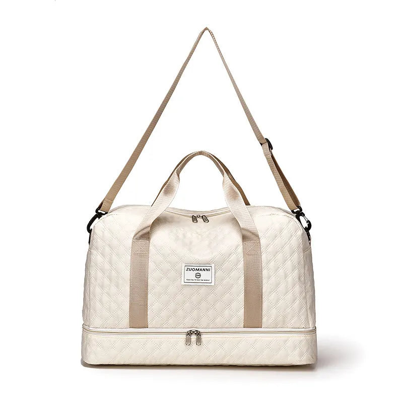 Large Oxford cloth leisure travel bag in a solid colour with a 36-55L capacity and breathable lining.