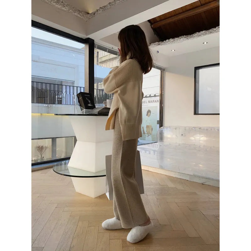 Women's high waist knitted wide-leg trousers in black colour with elastic waistband and straight-leg cut