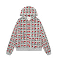 Women's grey cotton hooded cardigan sweater with a retro autumn pattern, shown in a street-fashion style.