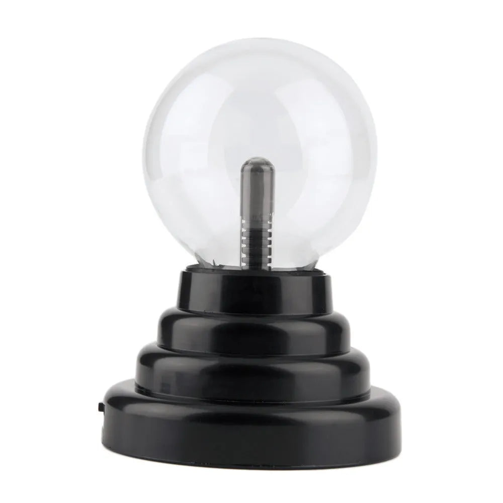 Colourful anti-radiation magic ball light with glass sphere on ABS base and USB cable.