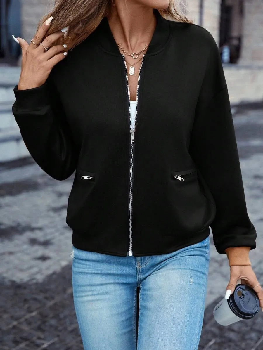 Women's black zip jacket with long sleeves and faux pocket design