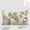 Green square pillow with abstract botanical plant and flower pattern on a sofa.