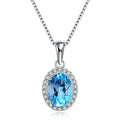 Four-piece sterling silver jewellery set with blue topaz stones including geometric earrings, ring, bracelet and necklace