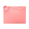 Light blue silicone painting mat with two attached bowls for watercolour supplies.