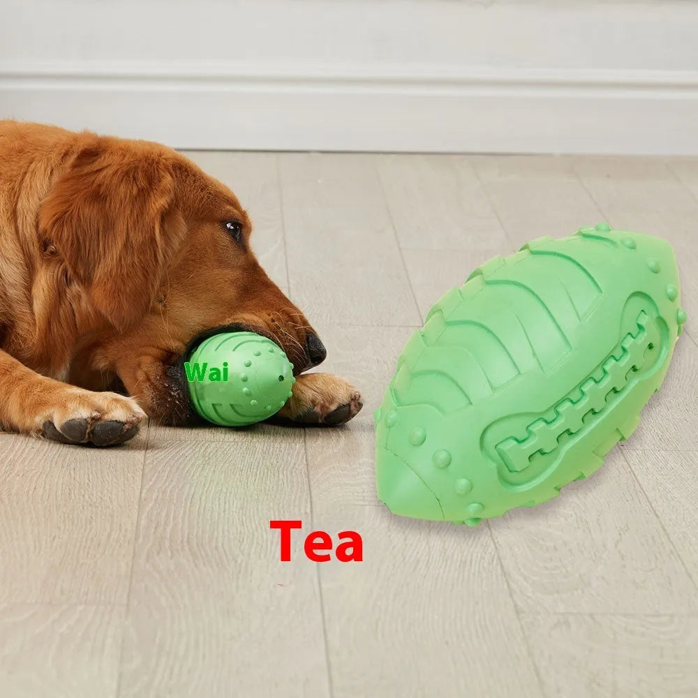 Light green rubber rugby ball dog toy with textured teeth cleaning surface