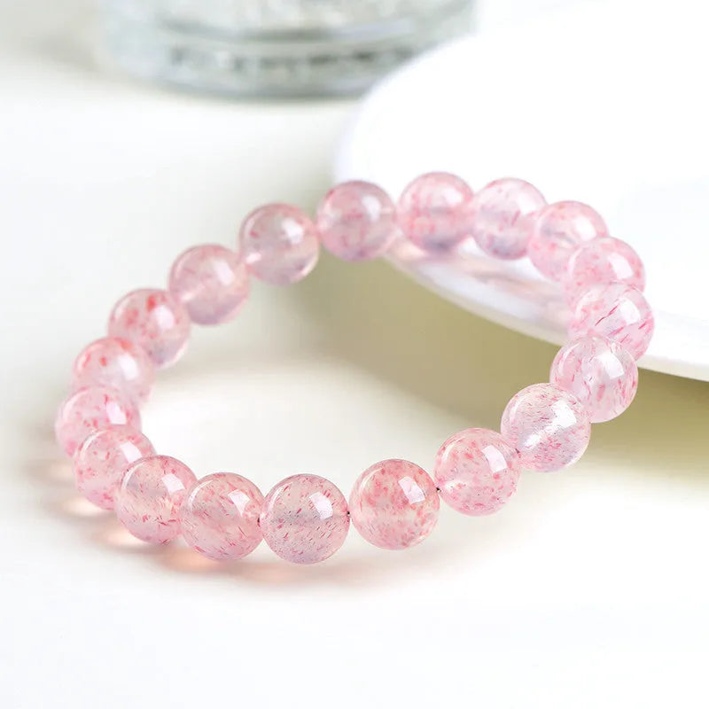 Strawberry quartz crystal bracelet with 10-10.8mm natural white water gemstone beads