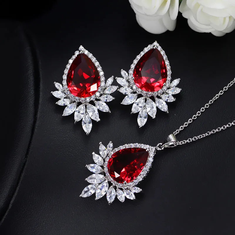 AAA formal jewellery set with cubic zirconia crystals in blue, red, and white colour options.