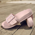 Women's grey blue EVA buckle slippers showing adjustable strap and soft sole.
