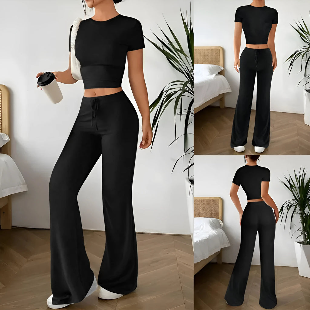Black polyester trouser suit set with high-waisted trousers and short sleeve V-neck top