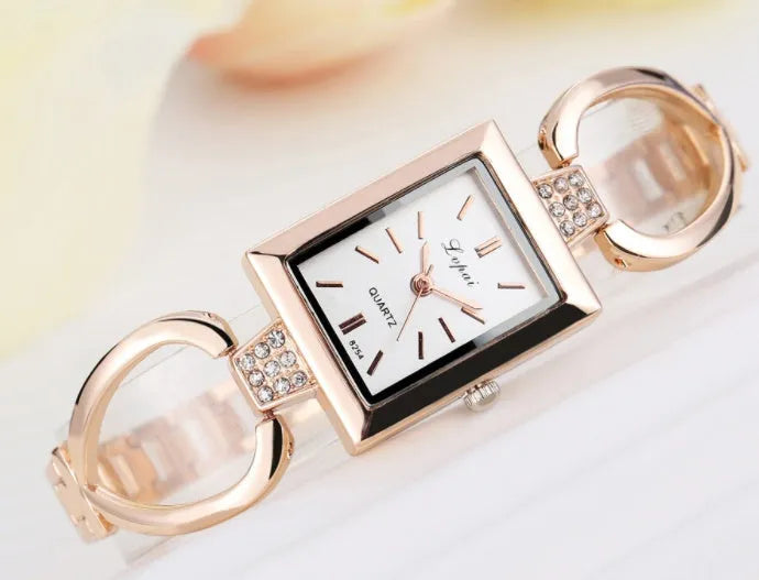 Women bracelet quartz wristwatch round dial silicone strap alloy case pin buckle silver rose gold