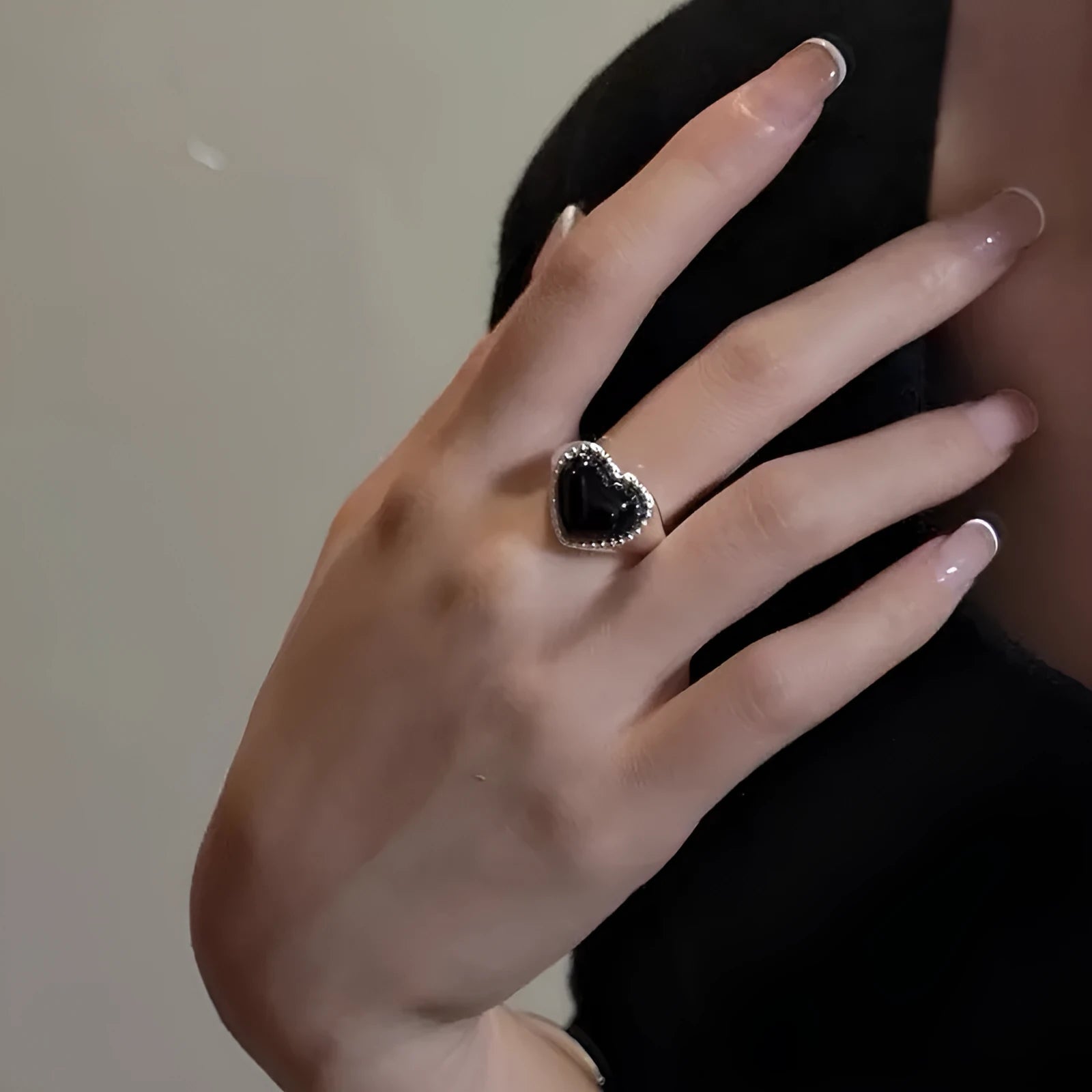 Adjustable sterling silver ring with black agate heart centrepiece