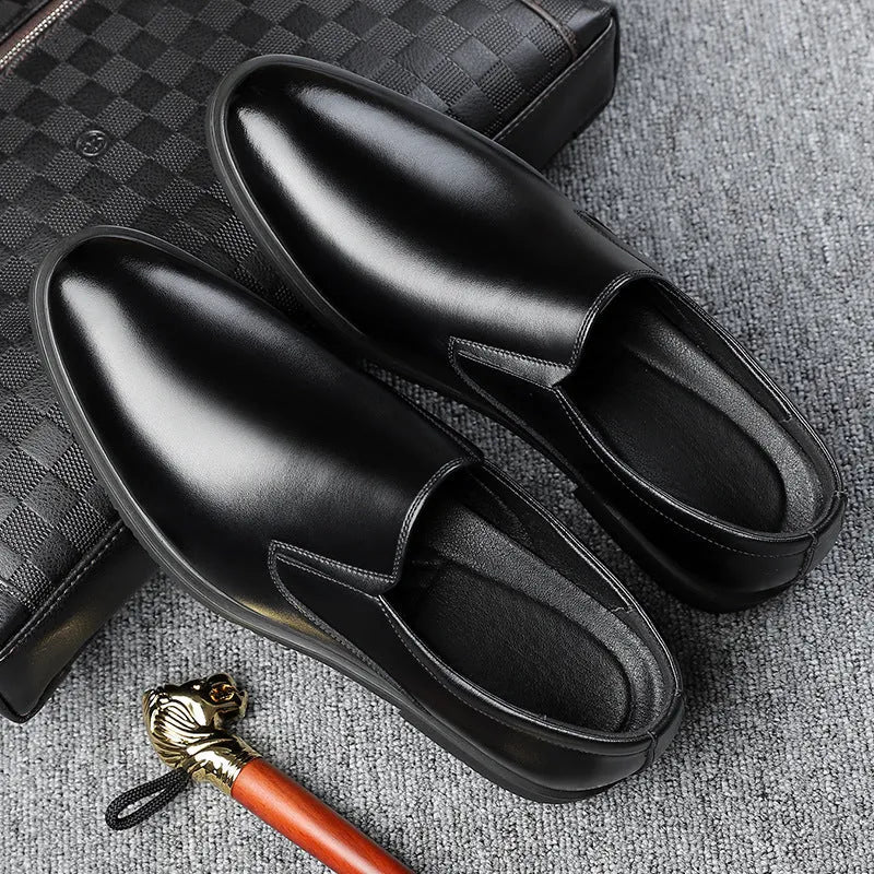Men's black renewable leather business casual slip-on shoes with rubber sole and leather toe cap.